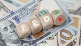 Fed Holds Rates Steady, Signals Two Cuts Ahead Despite Persistent Inflation and Growth Concerns