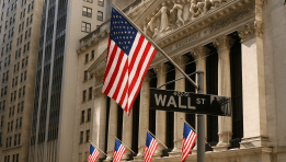 Wall Street Ends Higher Despite Volatility Spike; Tech Stocks Lead Gains as Small Caps Slip