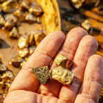 SKN | Gold Prices Slip Slightly as Volatility Sweeps Oil and Equity Markets on Turbulent Monday