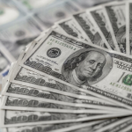 SKN | Dollar Holds Steady as Markets Await US Inflation Data for Federal Reserve Clues